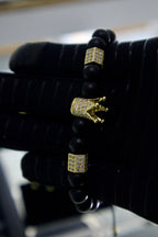 Pulsera Corona Negra/Dorada